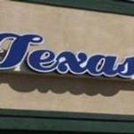 Texas Barber College logo